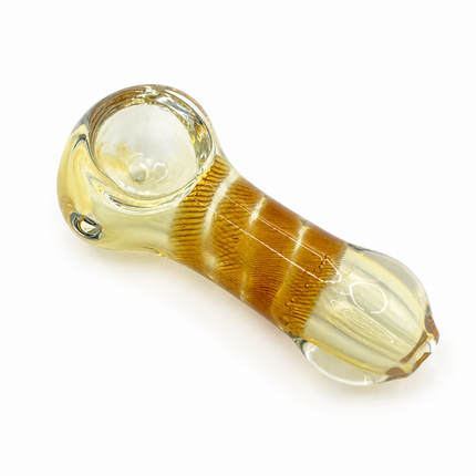 Close-up of amber glass spoon pipe bowl with side carb hole