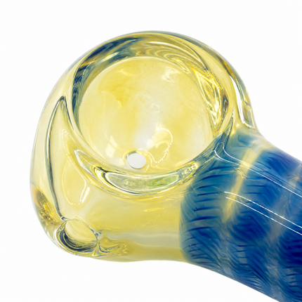 Close-up of blue glass spoon pipe bowl with striped design