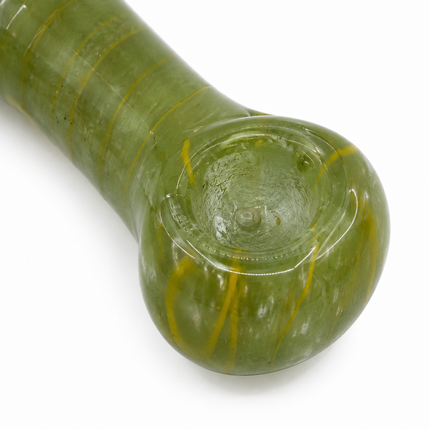 Top close-up of green glass spoon pipe bowl with translucent green finish