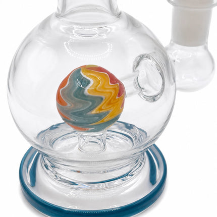 Close-up of the spherical chamber highlighting the multicolor orb percolator and teal-rimmed base