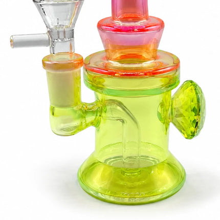 Angled side view of the mini water pipe highlighting the 14mm bowl, pink upper section, and neon yellow chamber