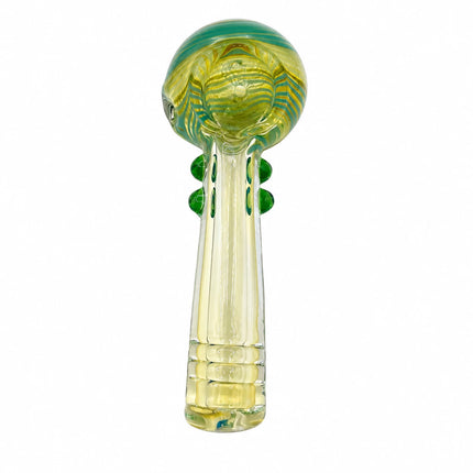 Side angle showing the thick glass construction, emerald dot grips, and yellow-green spiral detailing around the bowl