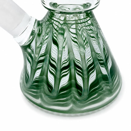 Close-up of the textured green fluted base showing the faceted glass pattern and rounded shape