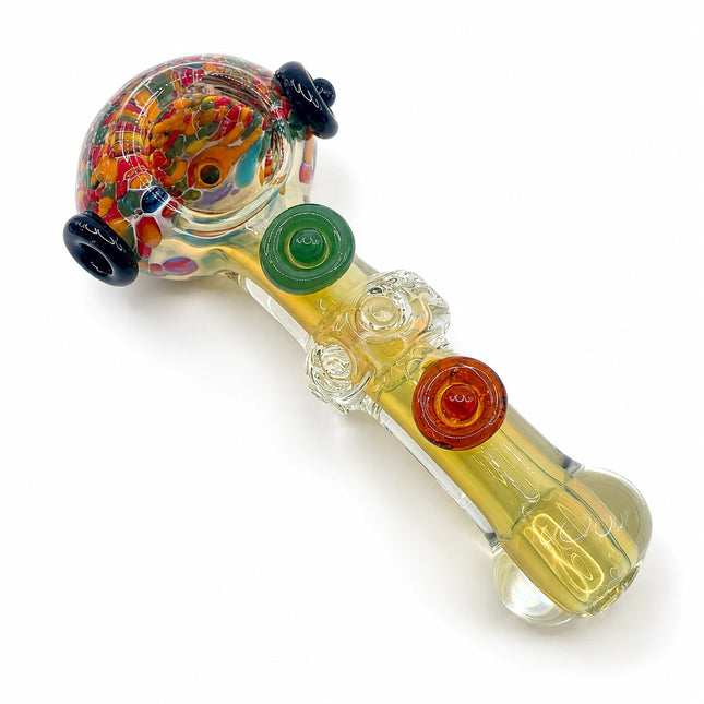 Angled view showing the 5-inch hand pipe’s multicolor bowl, green and orange marble accents, and translucent stem
