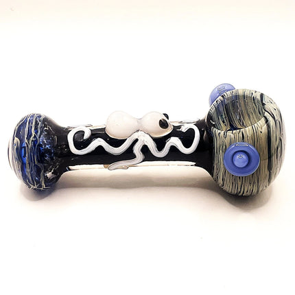 Horizontal side profile of the glass spoon pipe highlighting the centered white spider accent and textured marbled mouthpiece