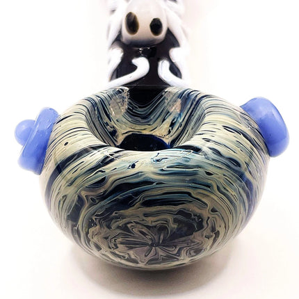 Close-up of the rounded bowl area with gray marbling, blue side knobs, and bold black-and-white spider-inspired design