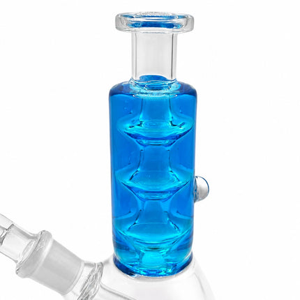 Close-up of the vivid blue triple-stack glycerin chamber inside the compact glass water pipe