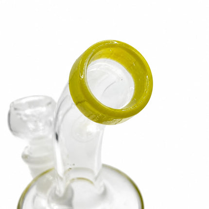 Top-down detail shot of the lime accent rim at the mouthpiece of the mini glass water pipe