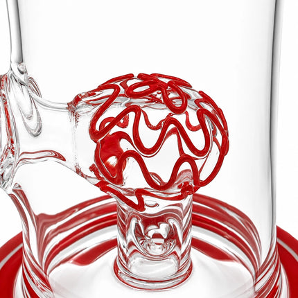 Close-up of the red dome percolator inside the clear chamber with red ring accents around the base