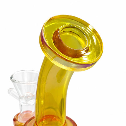 Close-up of the curved yellow chrome mouthpiece and flared top opening on the mini glass bong