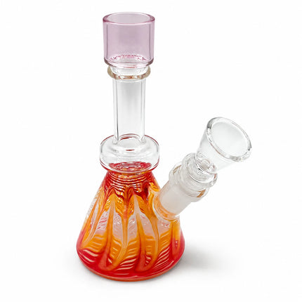 Three-quarter product angle showing the pink-tinted neck, removable clear bowl, and colorful sunset-inspired base
