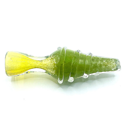 Horizontal close-up of the olive green chillum pipe highlighting the ribbed texture and pale yellow tip on a white background.