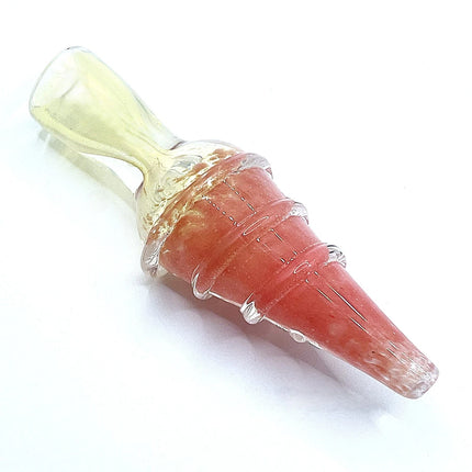 Compact coral pink one hitter glass pipe with ribbed texture and a translucent pale mouthpiece on a light gray background.