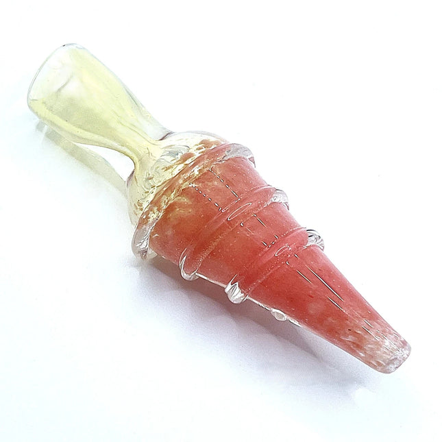Compact coral pink one hitter glass pipe with ribbed texture and a translucent pale mouthpiece on a light gray background.