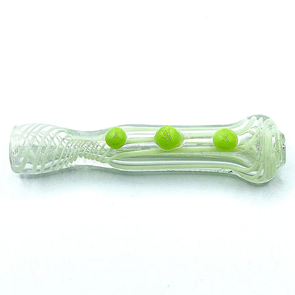 Horizontal side profile emphasizing the slim transparent body, rounded ends, and bright green decorative dots.